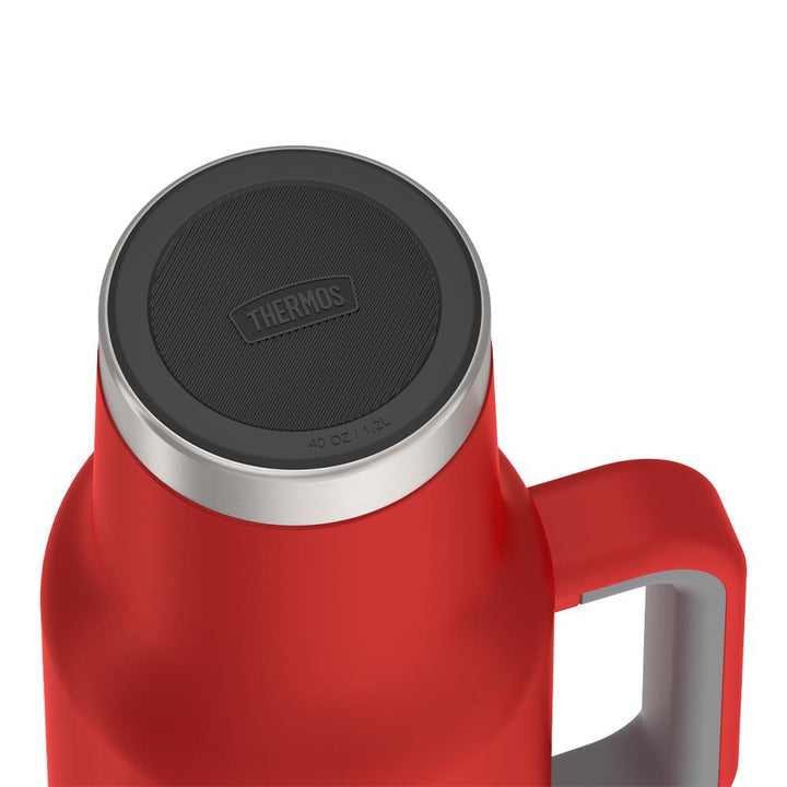 Thermos 40 ounce stainless steel cup holder mug with straw.
