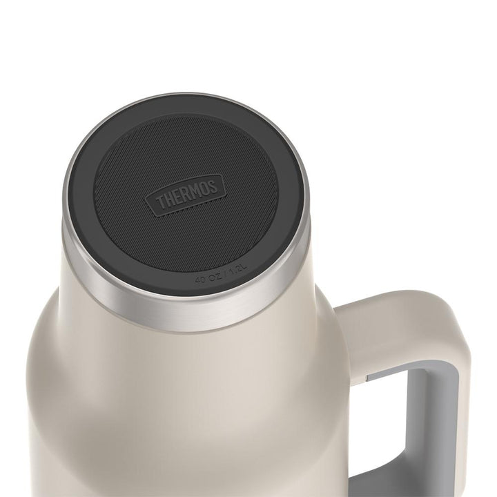 Thermos 40 ounce stainless steel cup holder mug with straw.