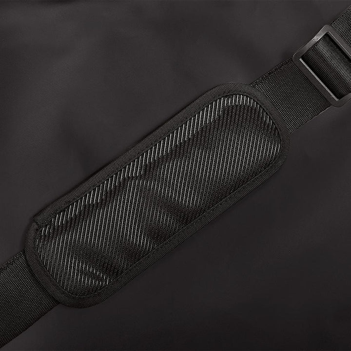 12 Can Icon Cooler, detail view of black carrying strap, in Granite.