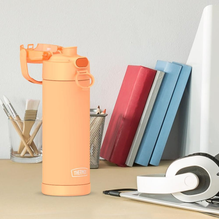 16-ounce Funtainer Stainless Steel Water Bottle with Spout and locking lid, Orange, side view, lid open, sitting on a table.