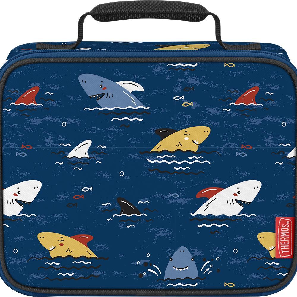 Kid lunch box with cute, smiling shark heads poking out of water.