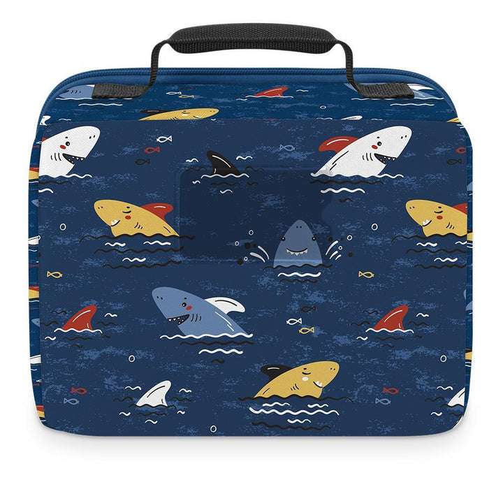 Kid lunch box with cute, smiling shark heads poking out of water.