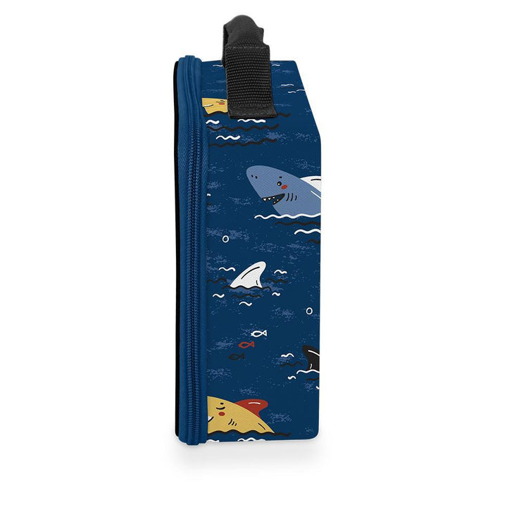 Kid lunch box with cute, smiling shark heads poking out of water.
