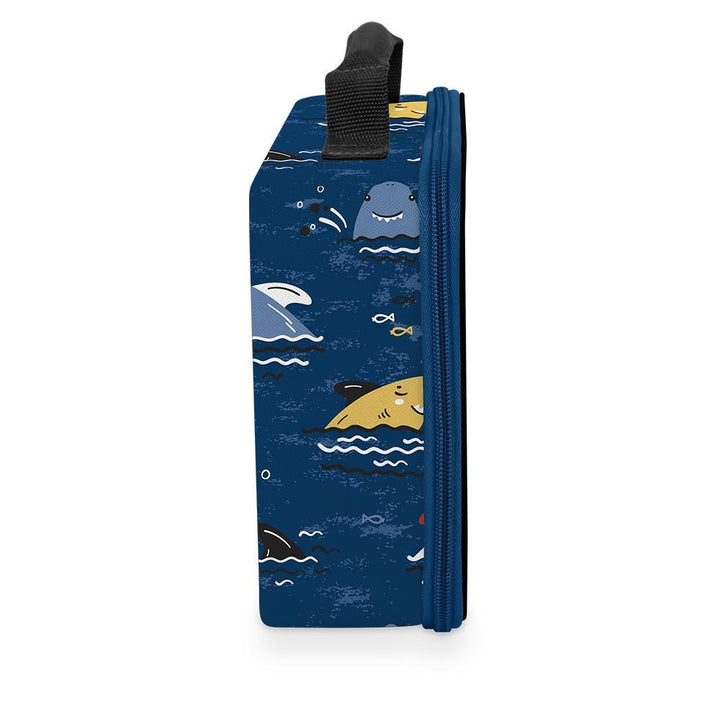 Kid lunch box with cute, smiling shark heads poking out of water.