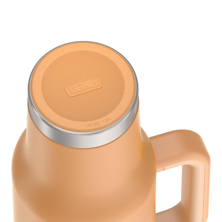 Thermos 40 ounce stainless steel cup holder mug with straw.