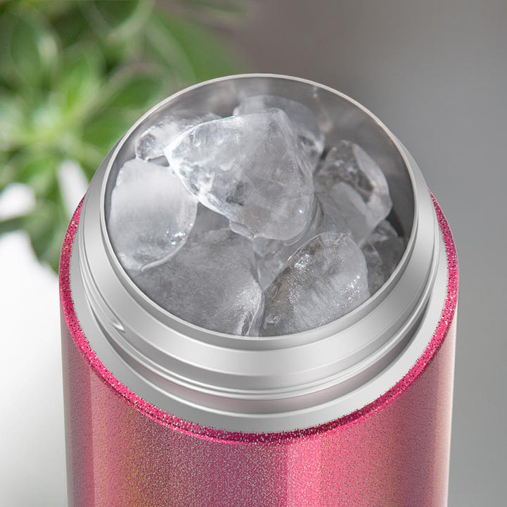 12 ounce iridescent pink Funtainer water bottle, opened, full of ice.